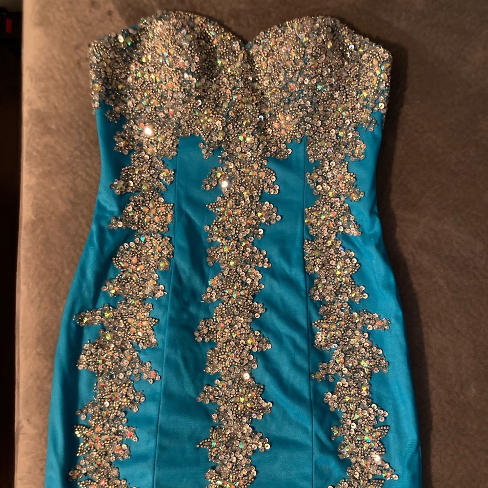 JOVANI - size 6 bright blue cocktail dress with silver details and beading.